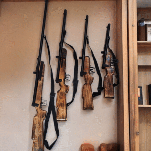 Handcrafted wooden rifle wall hanging with wrought iron detailing for home decor