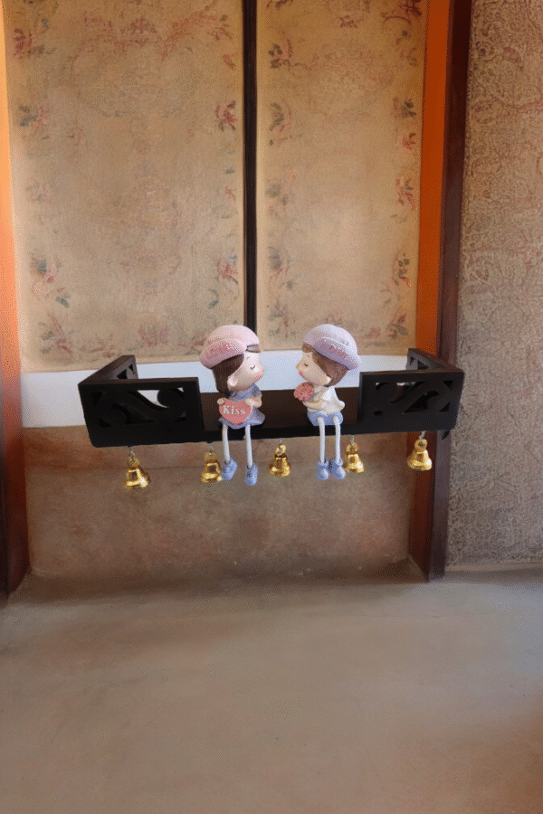 Wooden wall-mounted decorative swing with bells and figurines